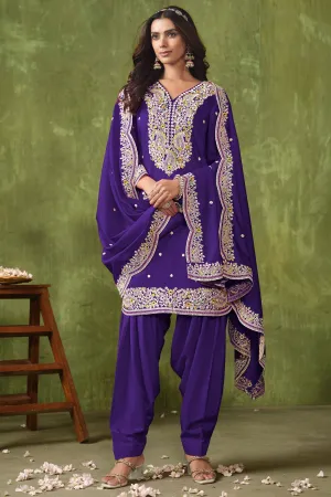 Engaging Purple Color Art Silk Fabric Festive Wear Salwar Suit