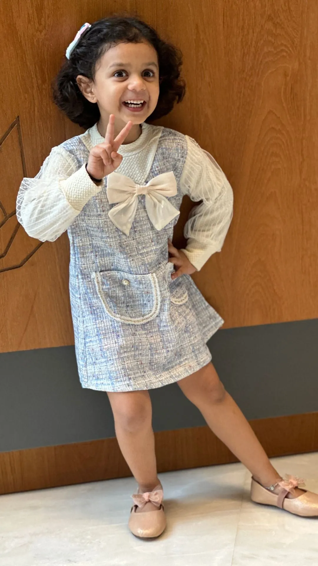 Pastel Blue Knitted Frock with Full Net Sleeves and Big Bow