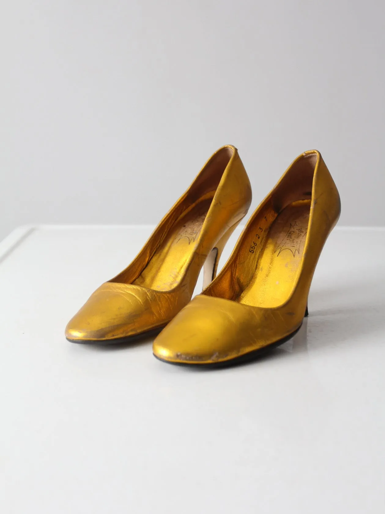 vintage gold metallic pumps